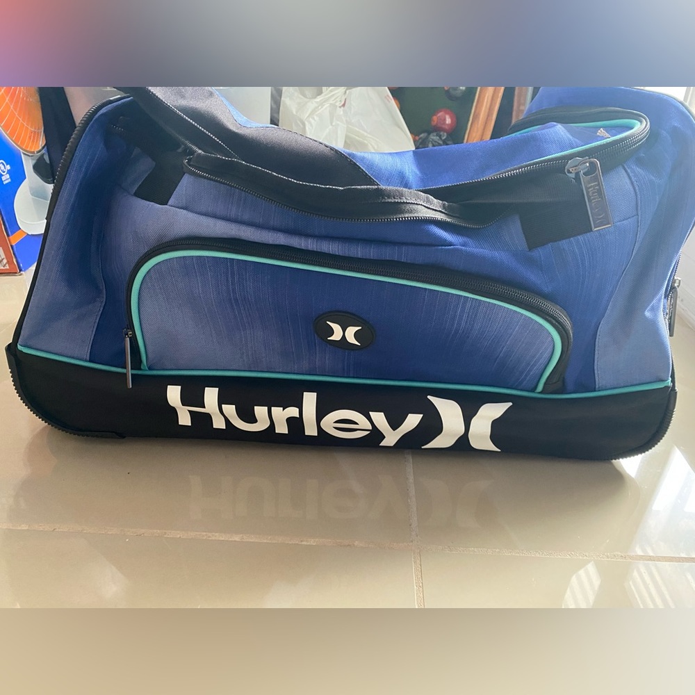 Hurley Rolling Duffel Bag Oversized Suitcase Luggage Gradient Blue and black